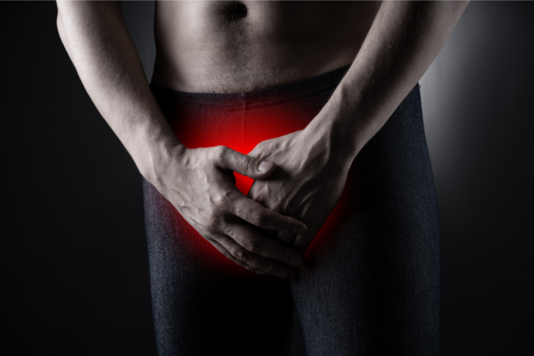 Man with prostate-area pain suffering symptoms of a urological or genital infection
