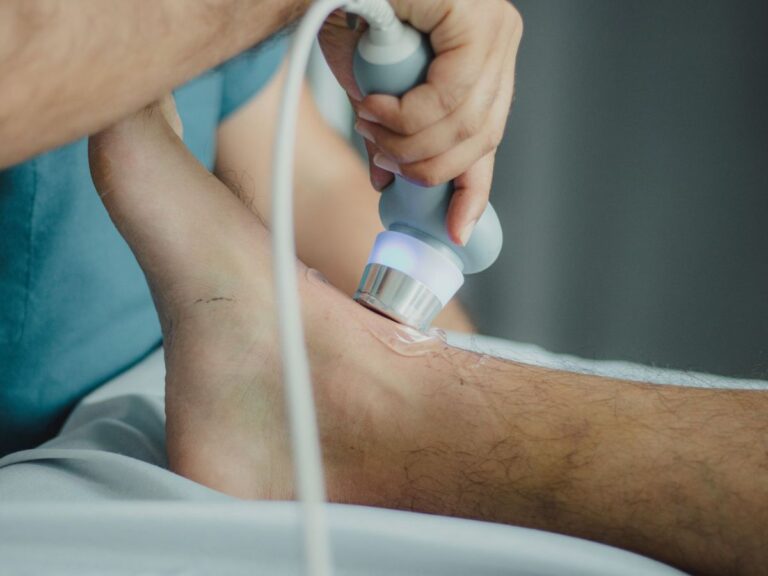 Ultrasound probe being applied to a patient's knee